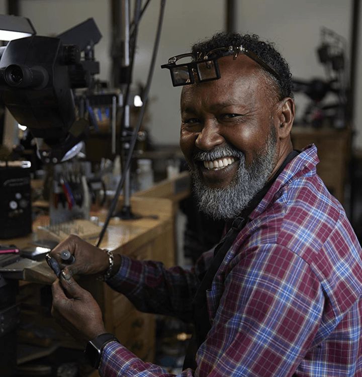 A Shane Co. Jeweler working on a piece of jewelry