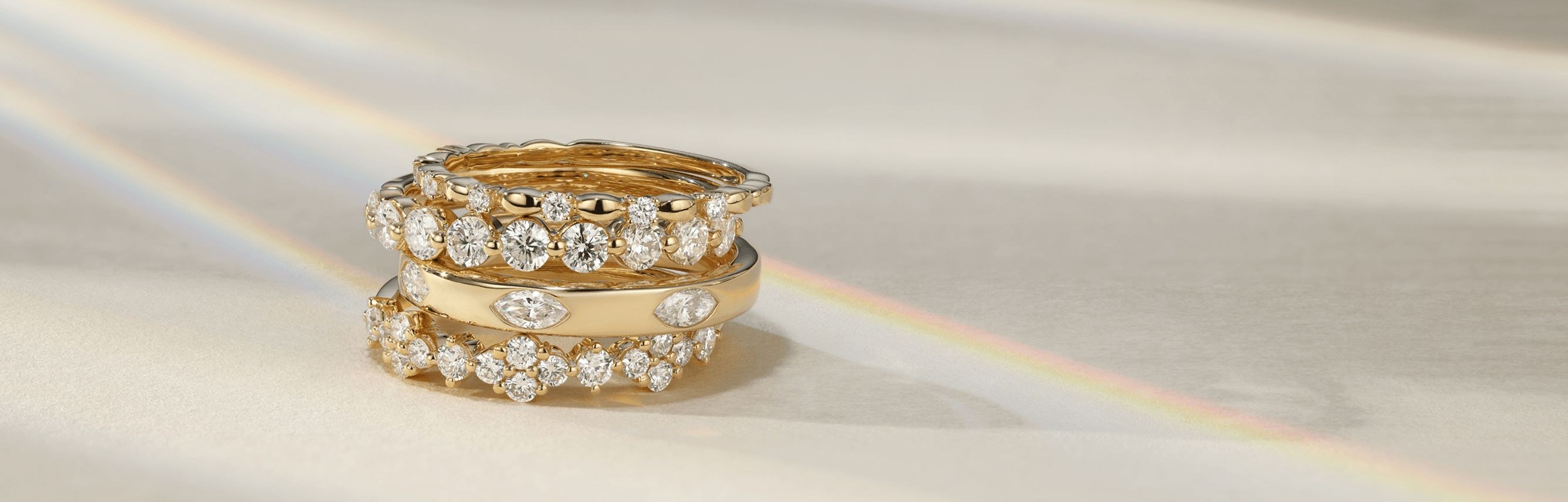 4 diamond wedding bands stacked on top of each other