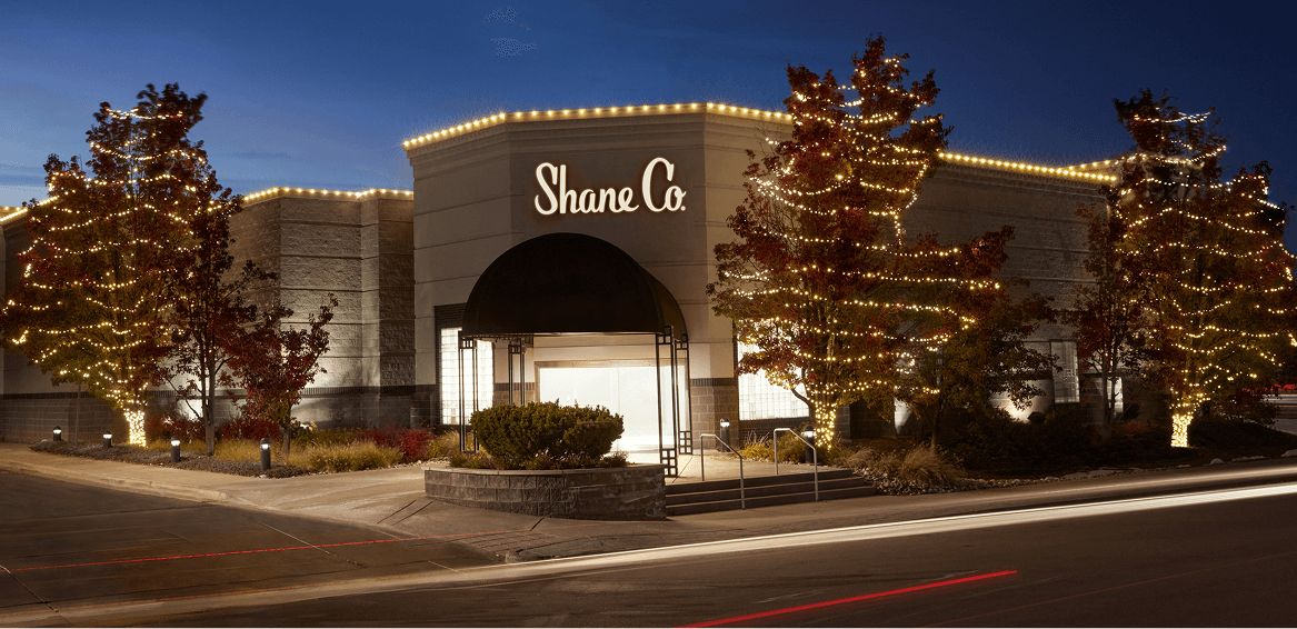 A Shane Co. store decorated with holiday lights