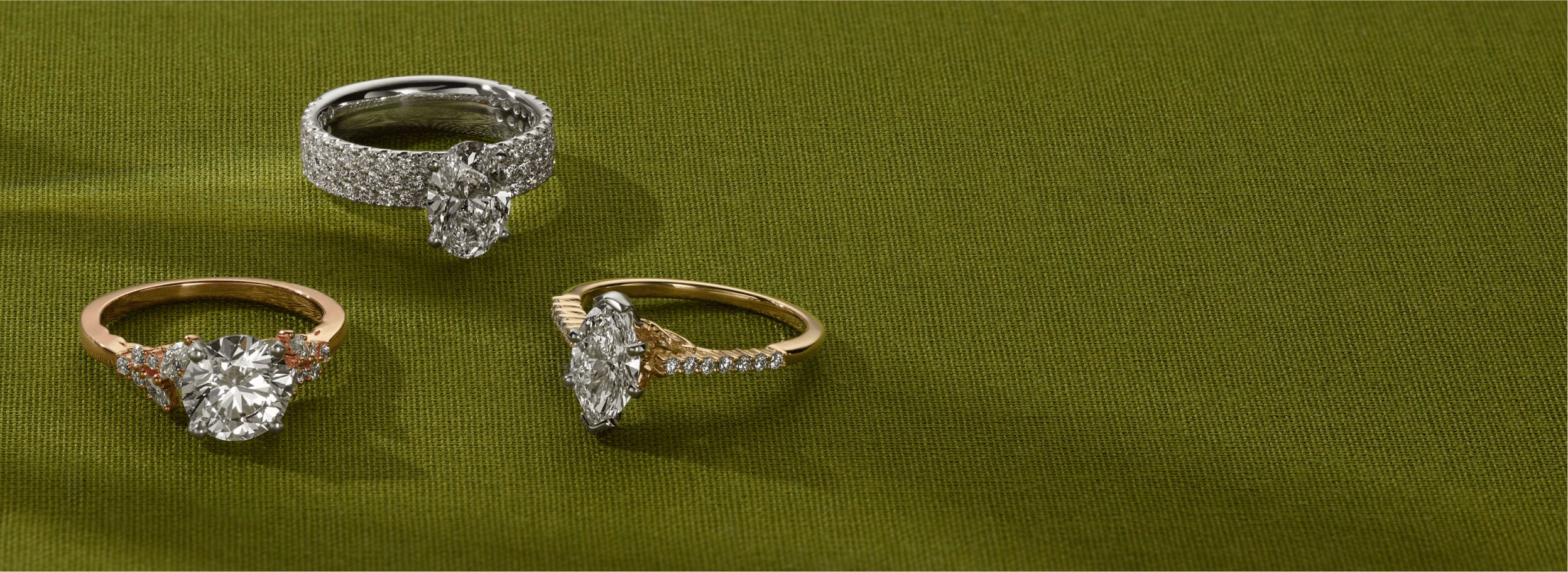 Three engagement rings of different styles