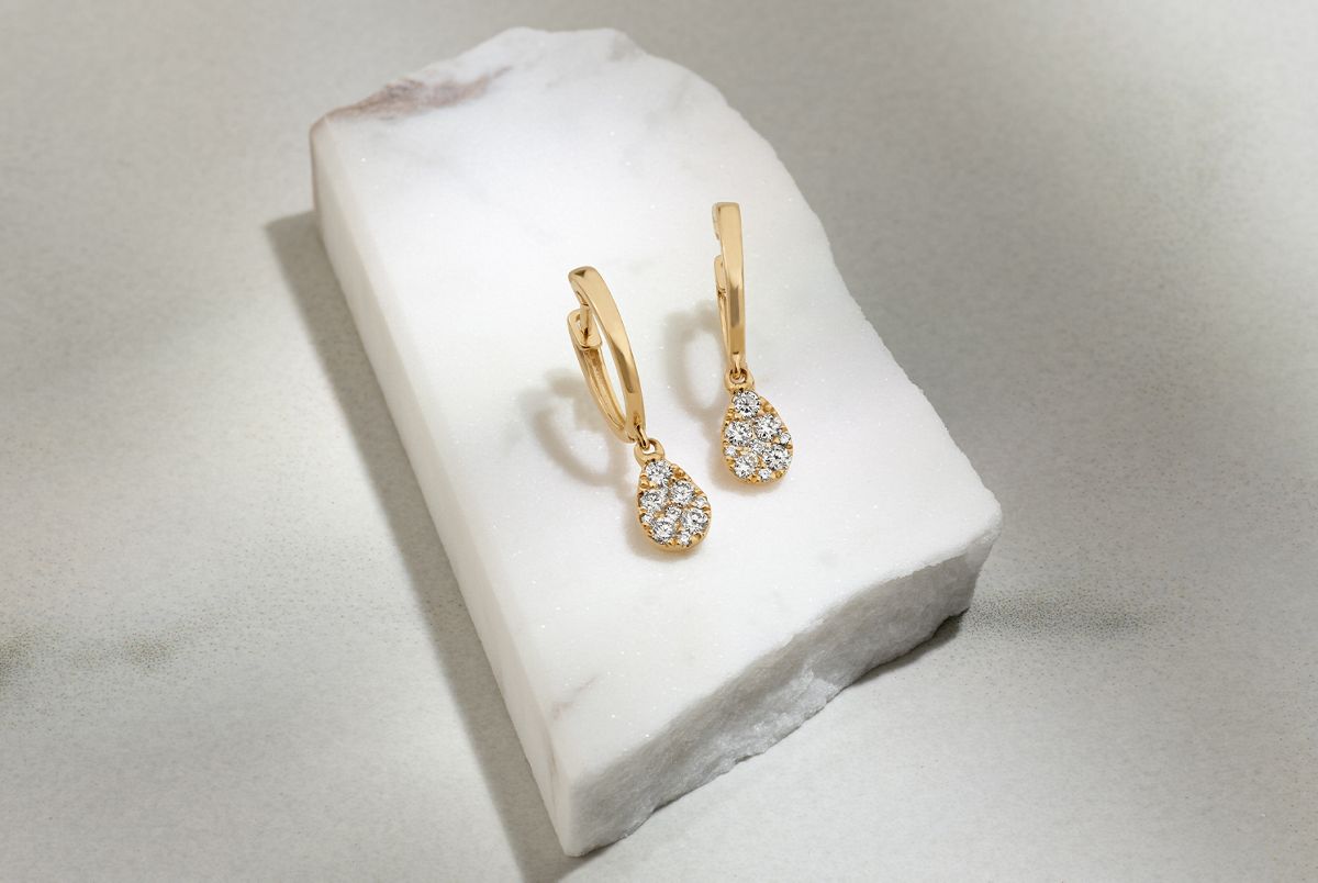 A pair of Diamond cluster Earrings