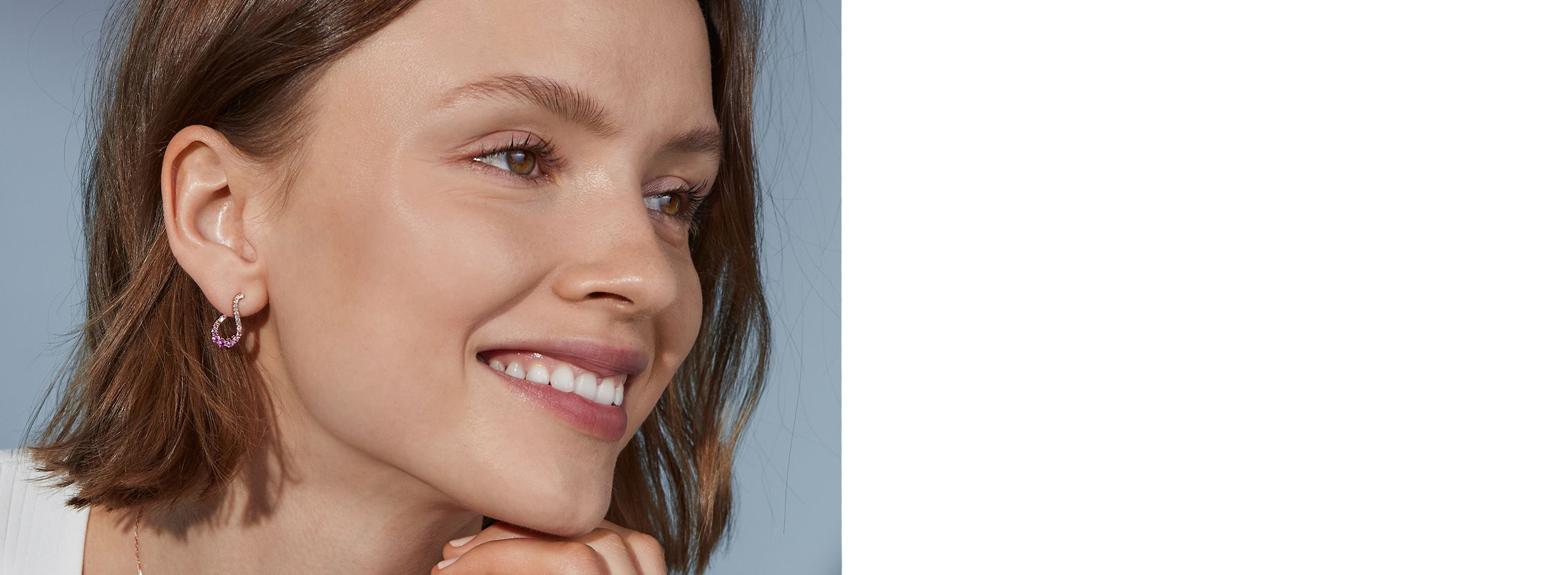 Side Profile of Woman Wearing Diamond Earrings