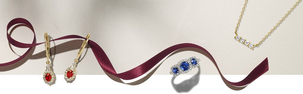 Mobile Image of holiday ribbon and classic jewelry