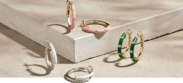 Mobile Image of a collection of enamel hoop earrings