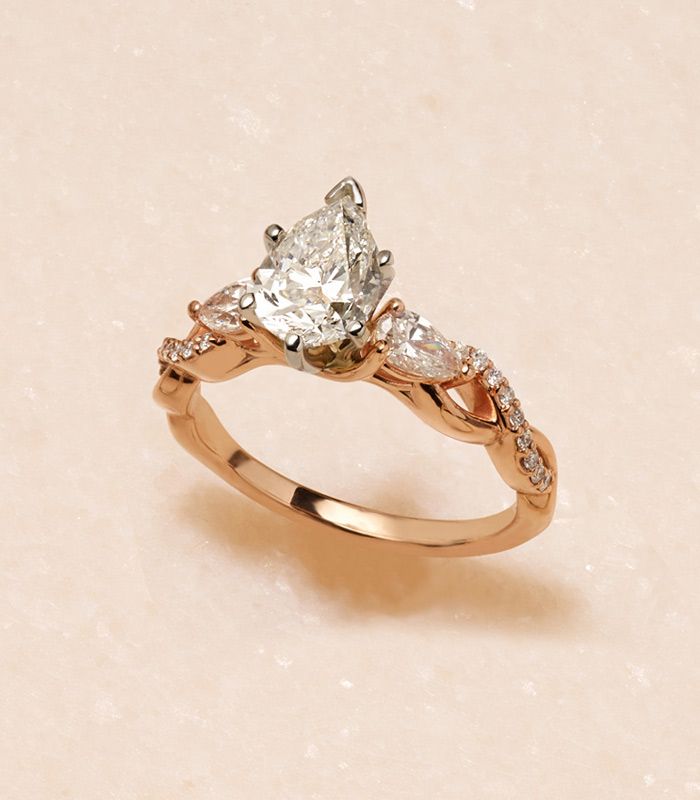 A Yellow Gold Infinity Engagement Ring