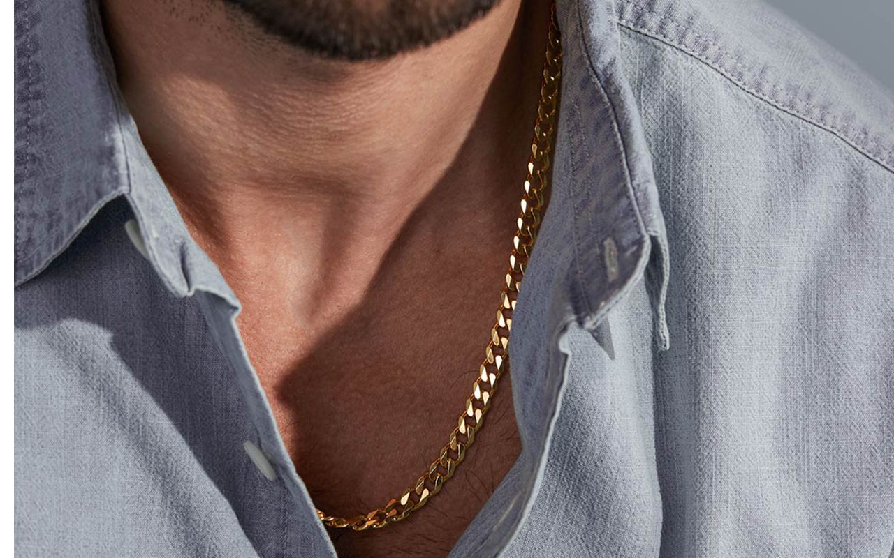 A man wearing a gold chain