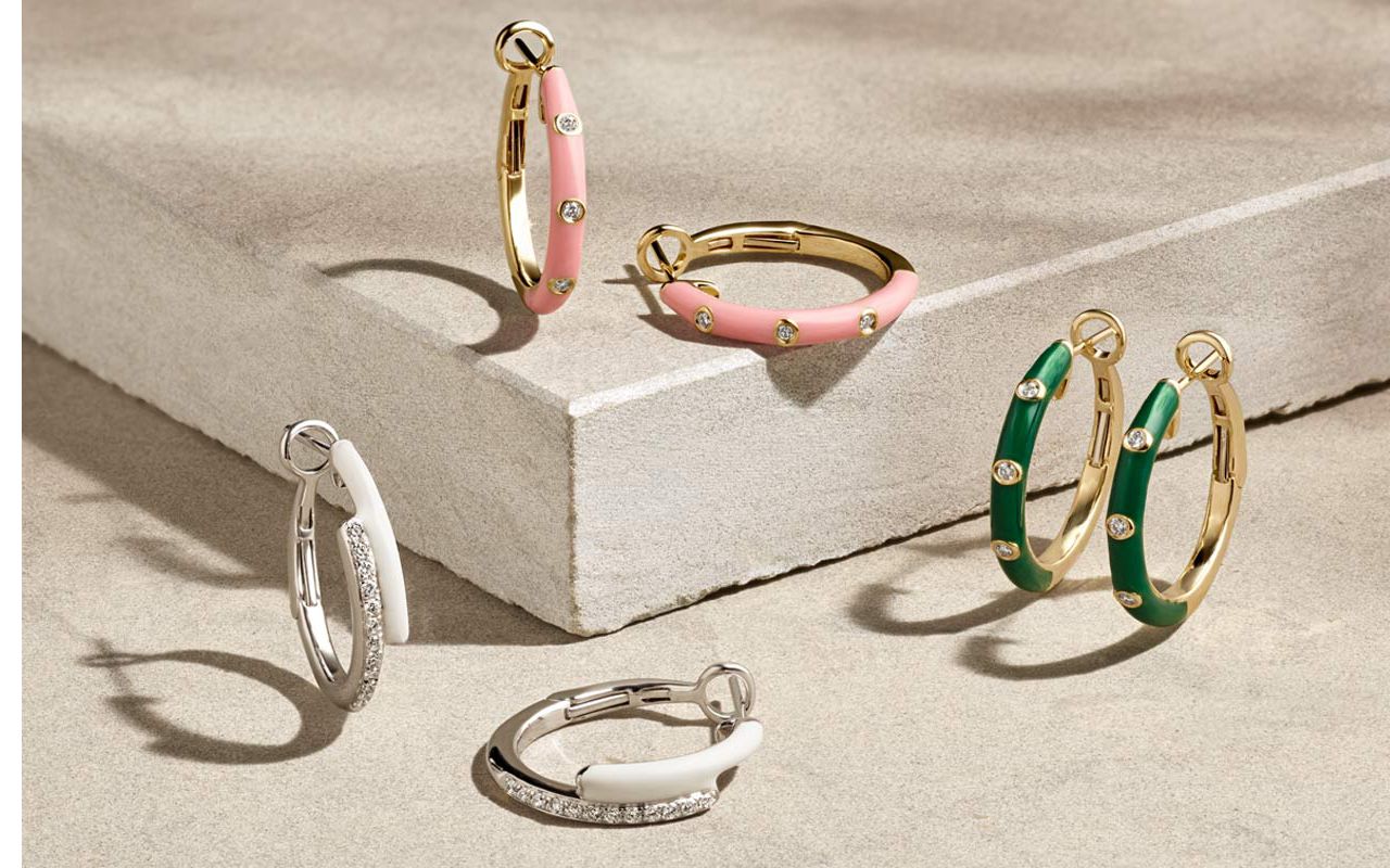 A collection of enamel and gold fashion earrings