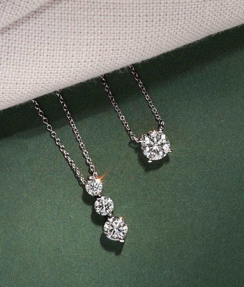 A collection of diamond pendants