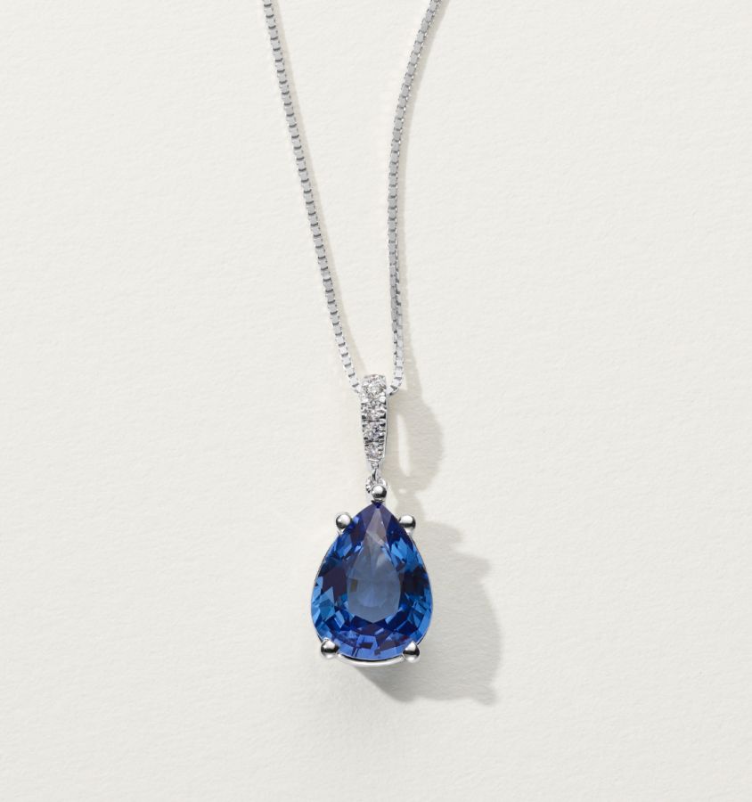 A sapphire and diamond fashion pendant