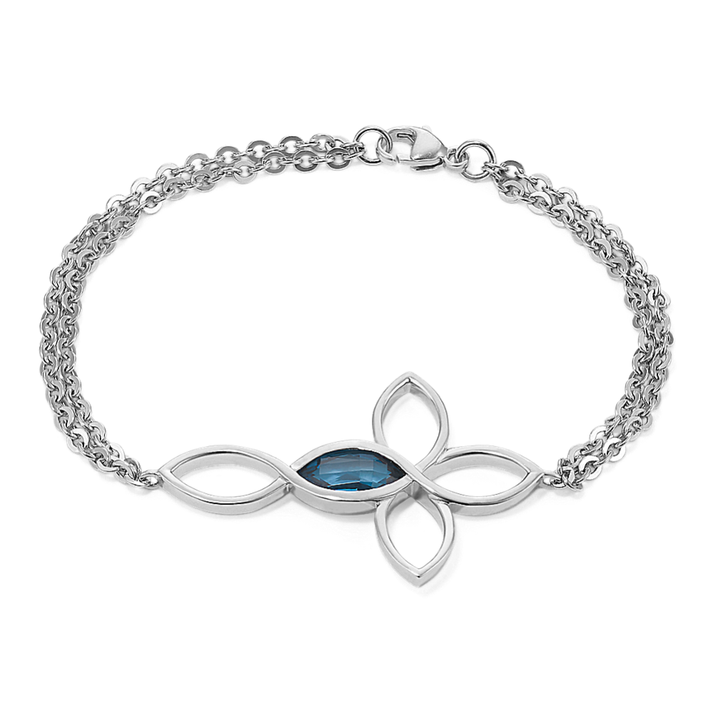 Cross-Faceted Blue Topaz Eyelet Cross Bracelet