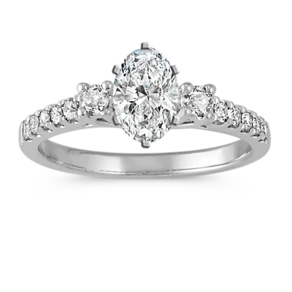 Cathedral Three-Stone Diamond Engagement Ring in Platinum