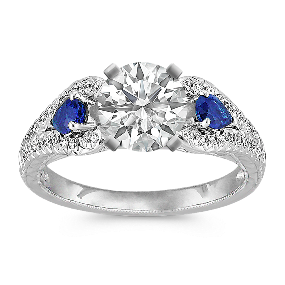 Vintage Pear-Shaped Sapphire and Round Diamond Platinum Engagement Ring