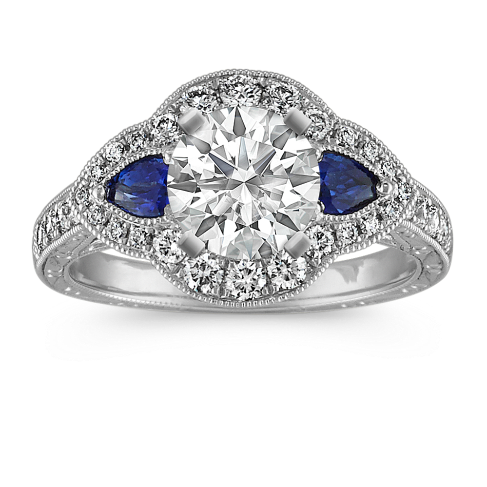 Pear-Shaped Traditional Sapphire and Round Diamond Platinum Engagement Ring
