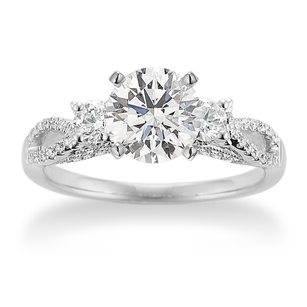 Poesie Three-Stone Engagement Ring in Platinum