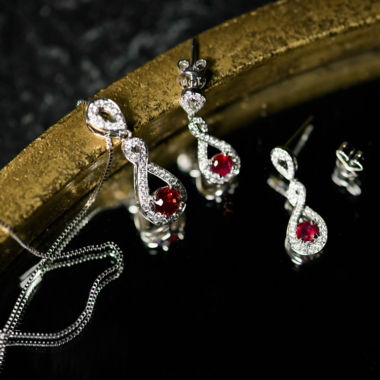 Natural Ruby and Natural Diamond Swirl Earrings
