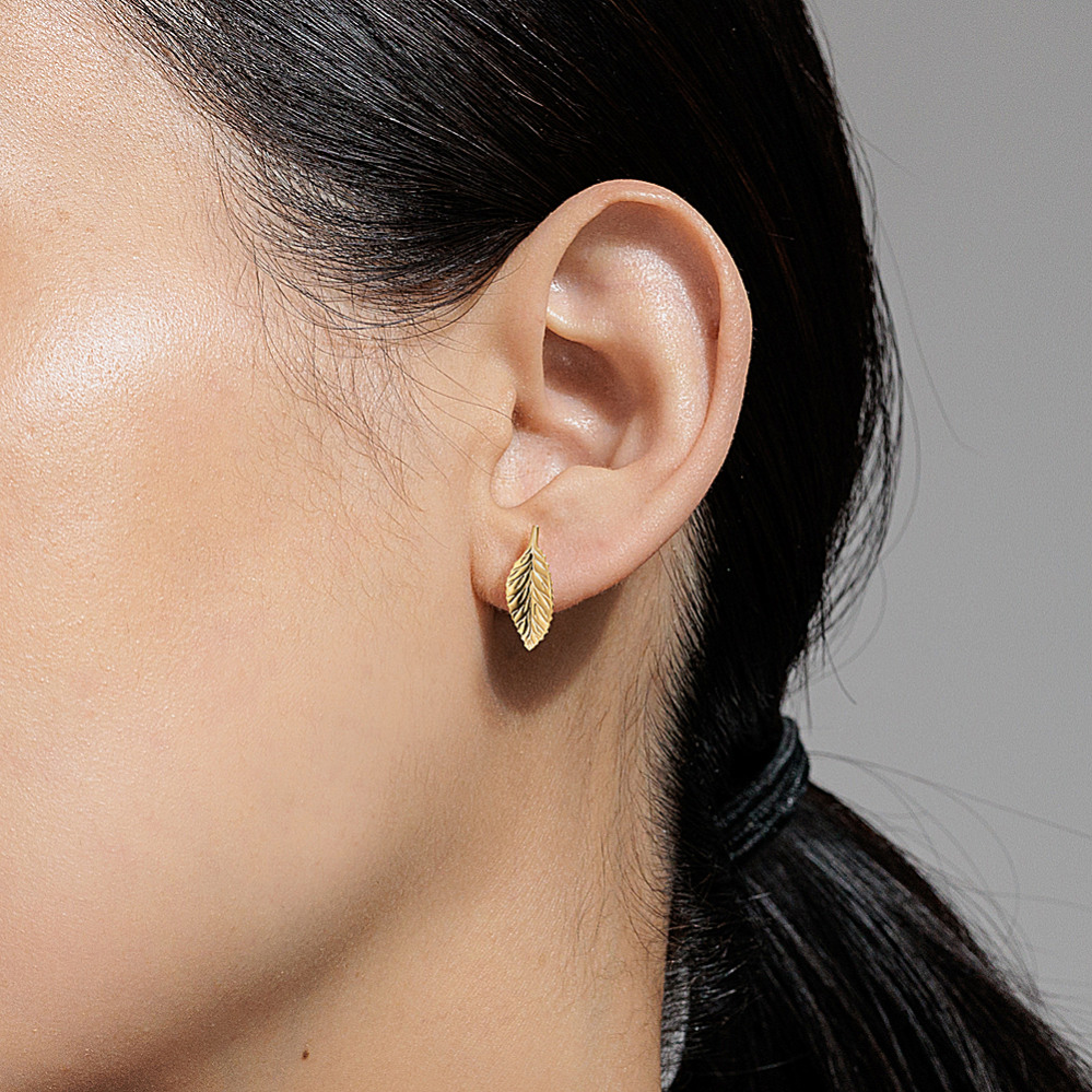 Gold earrings leaf design discount