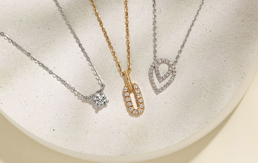 A collection of diamond pendants
