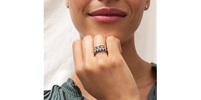 Mobile Image Of Close Up of Two Fashion Rings on Woman's Hand