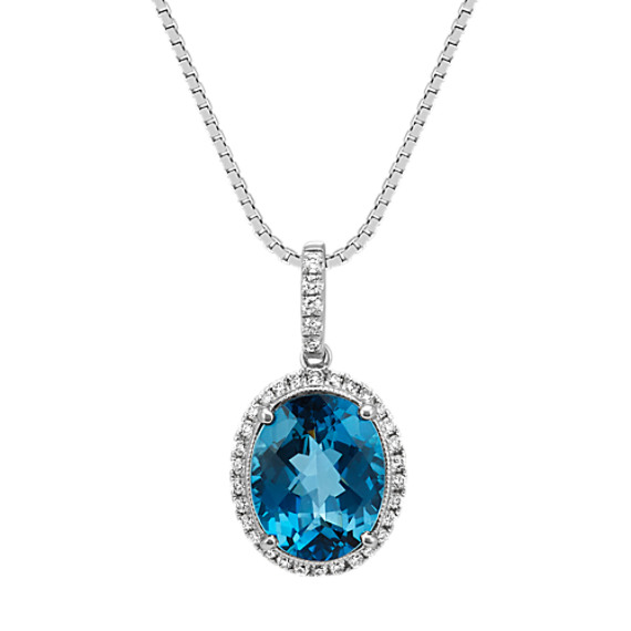 Oval London Blue Topaz and Diamond Halo Pendant (18 in) | Shane Co.