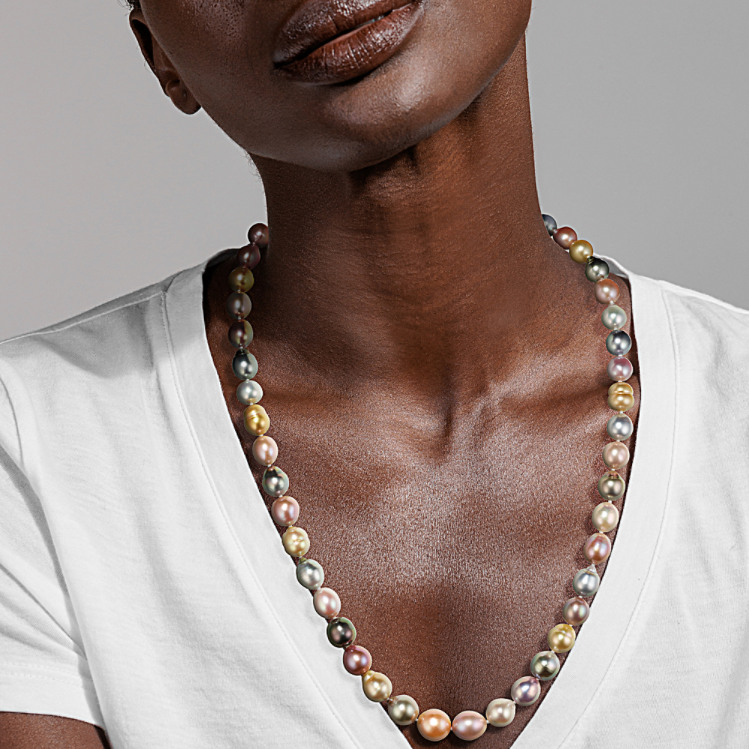 Pink pearl bracelet and earrings top