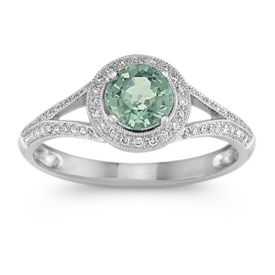 A White Gold Ring With Round Green Sapphire
