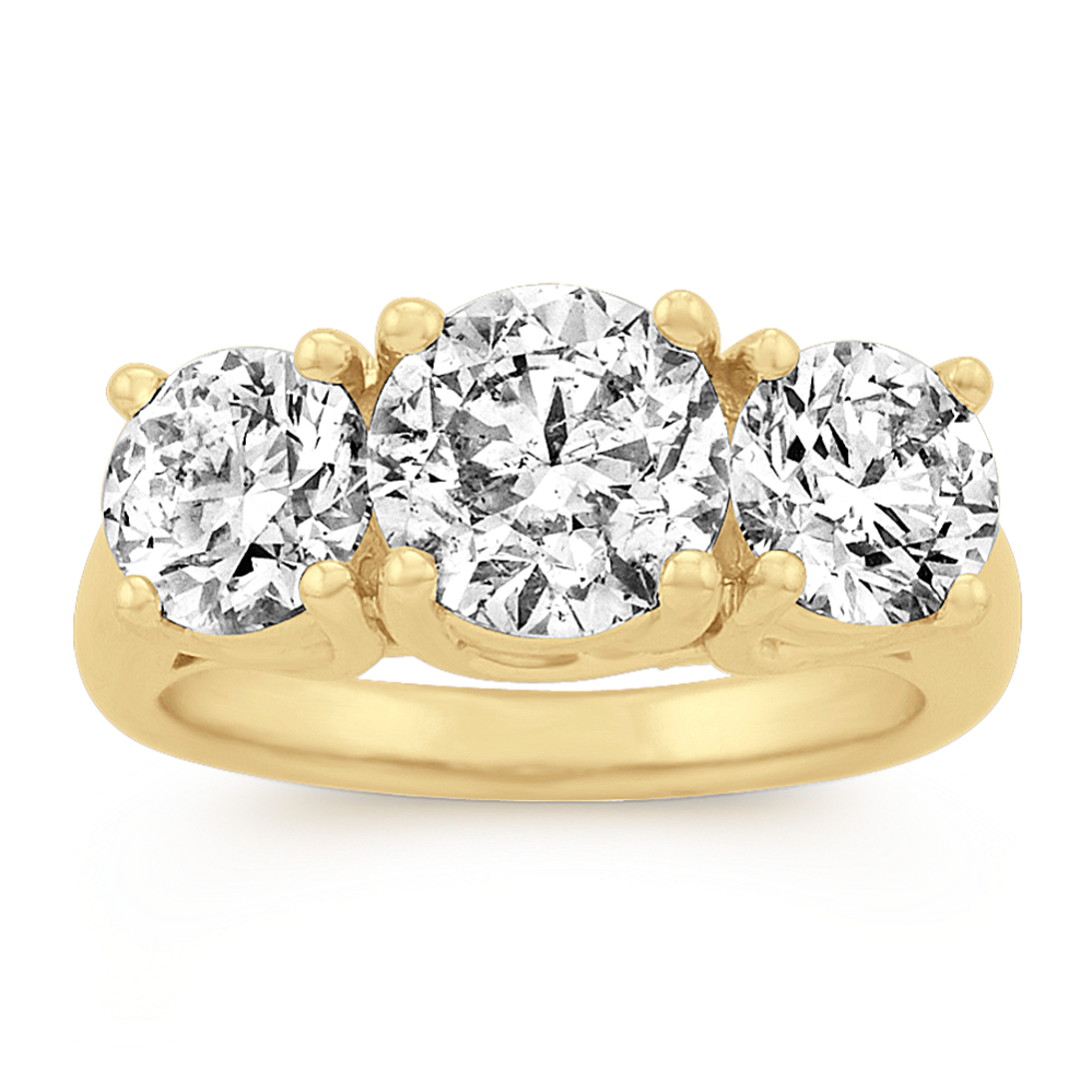 Classic Three-Stone Round Diamond Ring in Yellow Gold