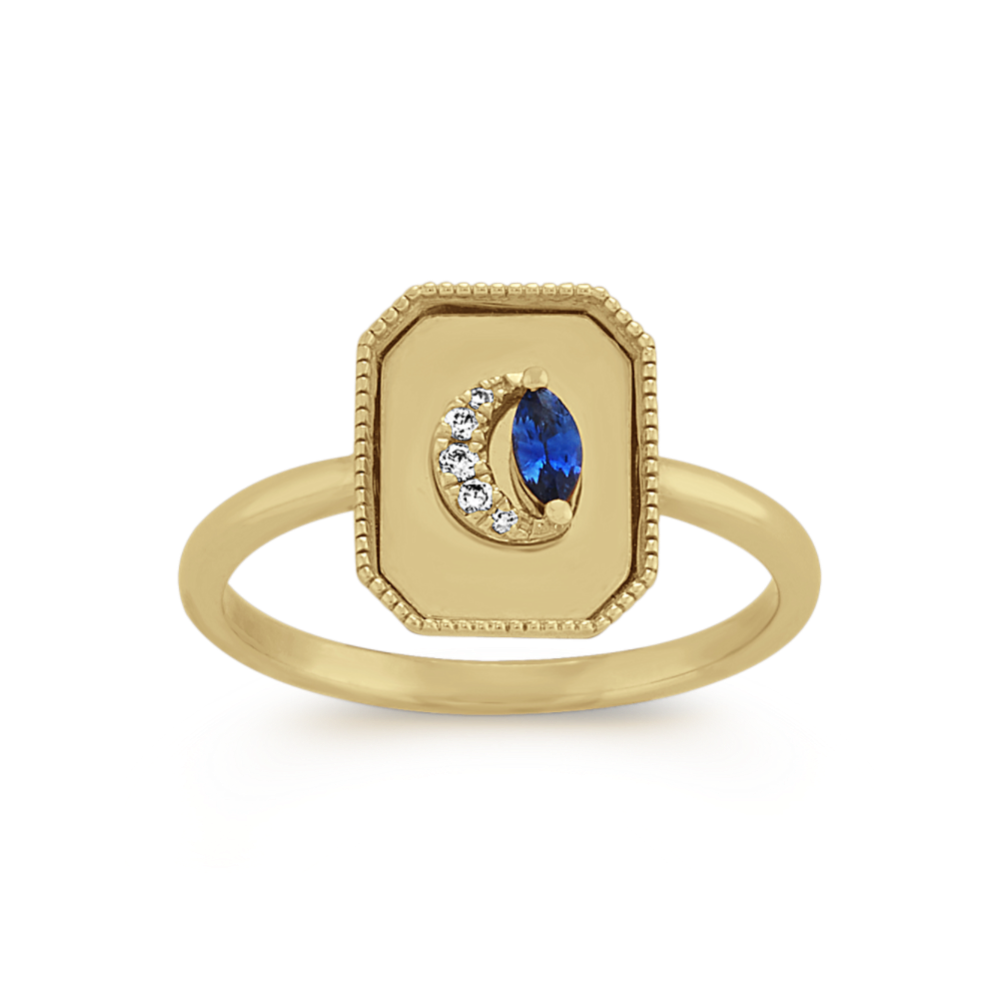 Marquise Sapphire and Round Diamond Ring