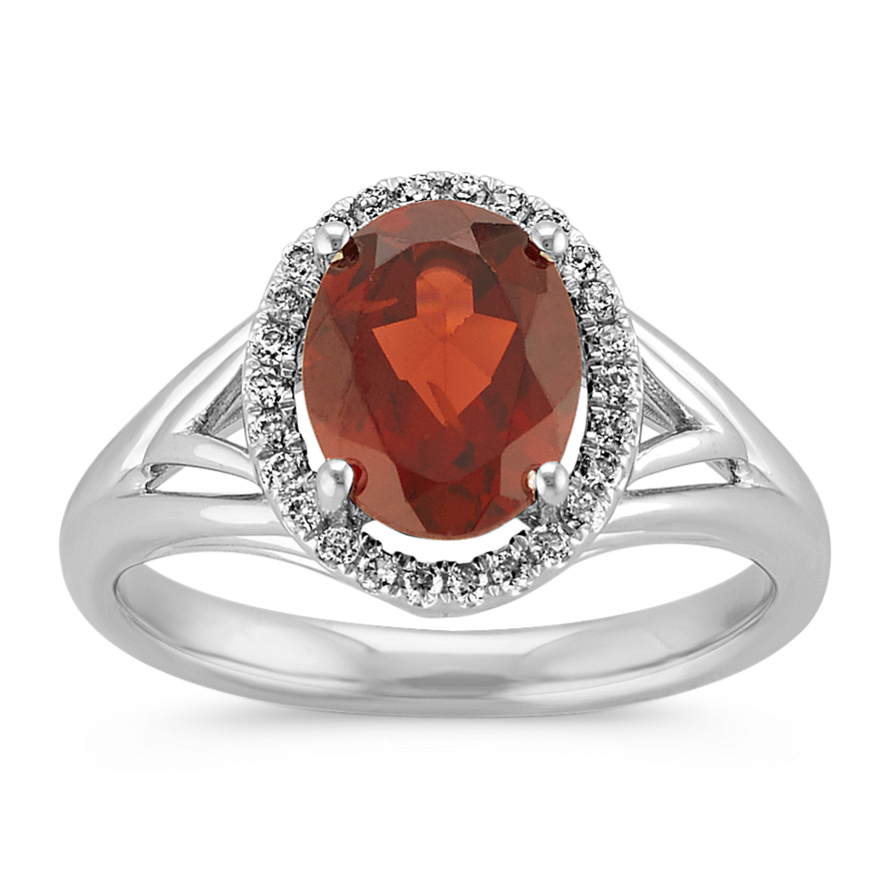 Oval Garnet and Round Diamond Halo Ring in Sterling Silver