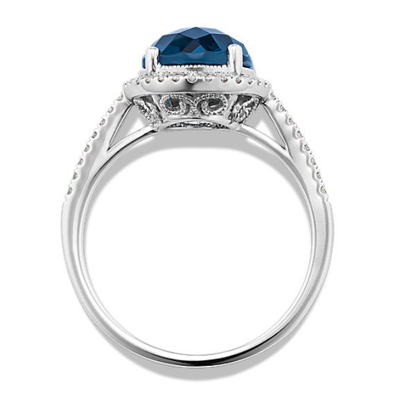 Oval London Blue Topaz and Round Diamond Halo Ring | Shane Co.