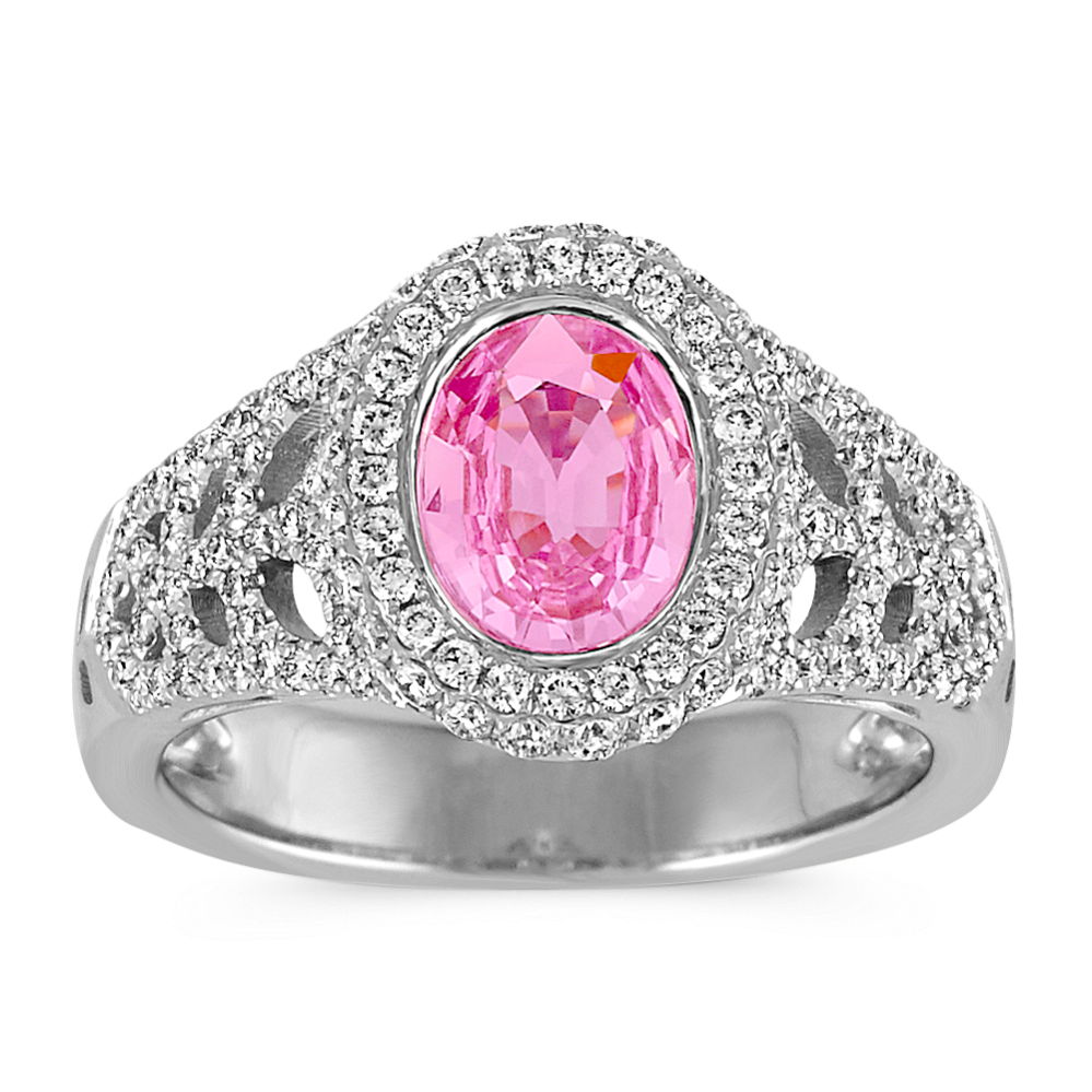 Oval Pink Sapphire and Round Diamond Halo Ring