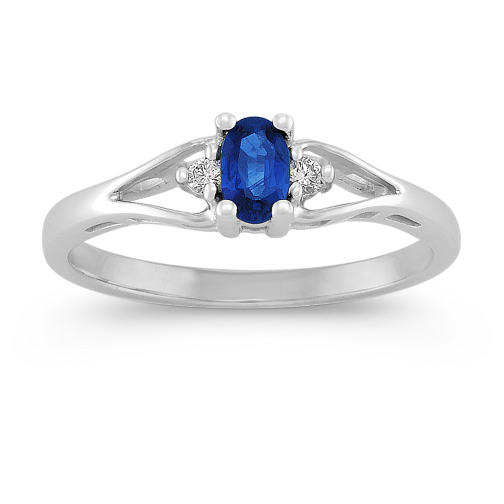 Oval Sapphire and Round Diamond Three-Stone Ring