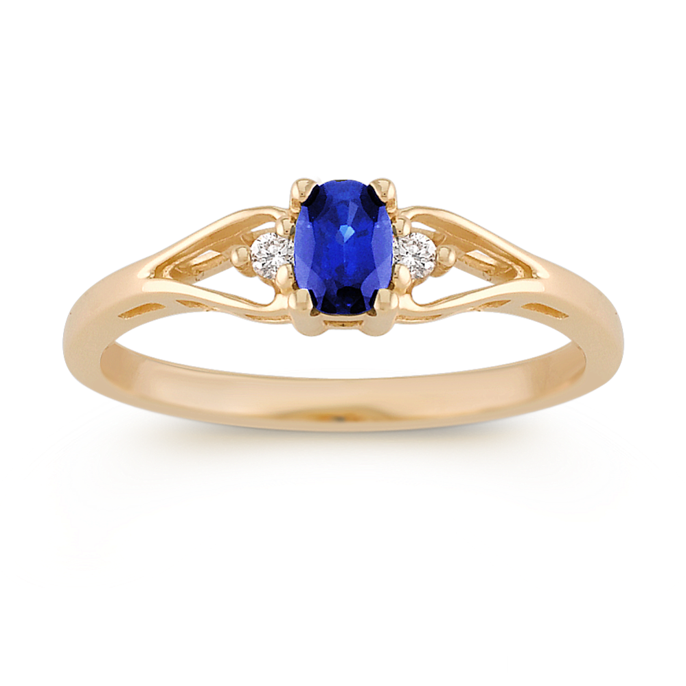 Oval Sapphire and Round Diamond Three-Stone Ring