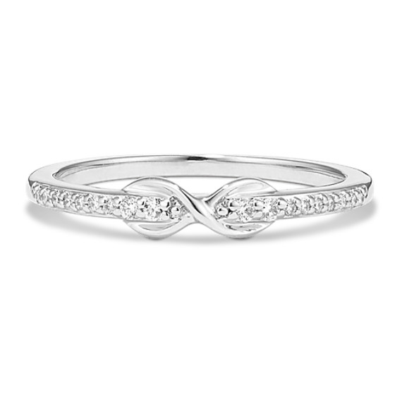 infinity ring with diamond in middle