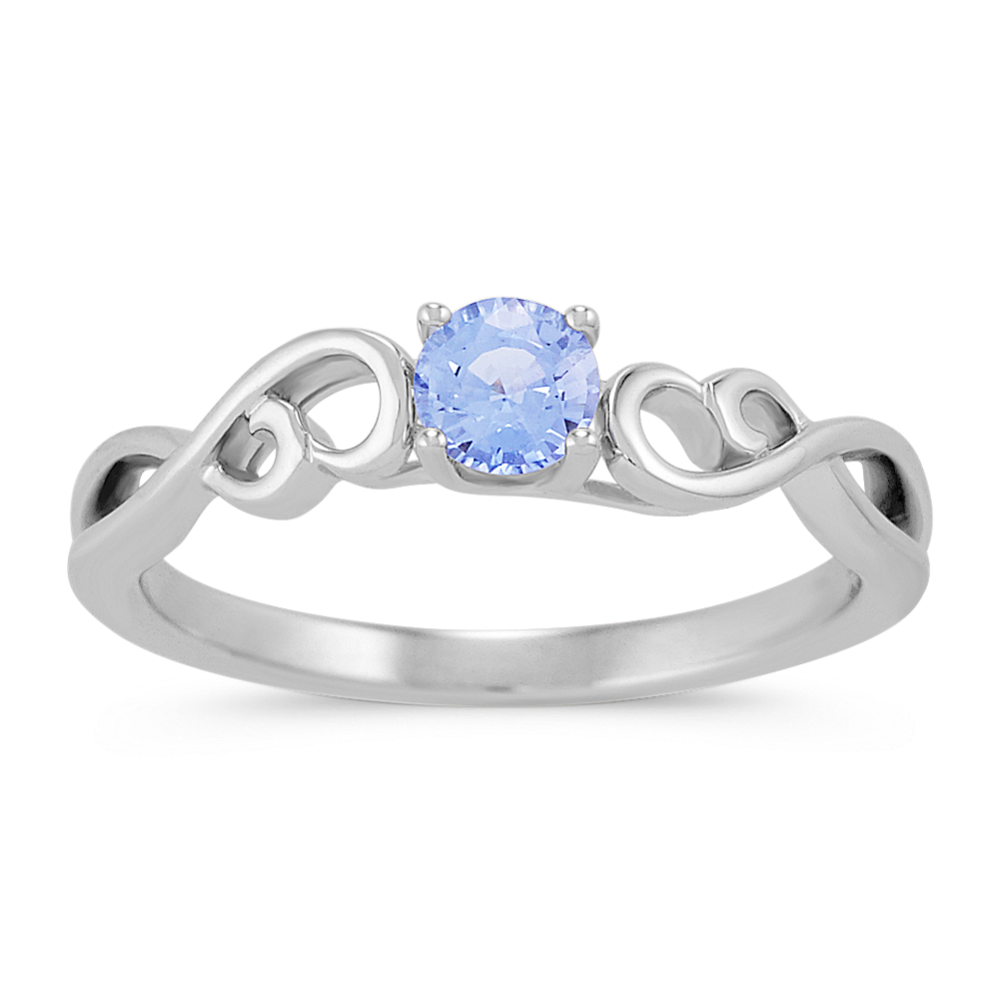 Round Ice Blue Sapphire Swirl Ring in Sterling Silver