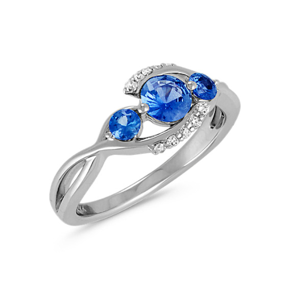 Round Kentucky Blue Sapphire and Diamond Swirl ThreeStone Ring Shane Co.
