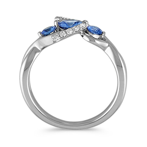 Round Kentucky Blue Sapphire and Diamond Swirl Three-Stone Ring | Shane Co.
