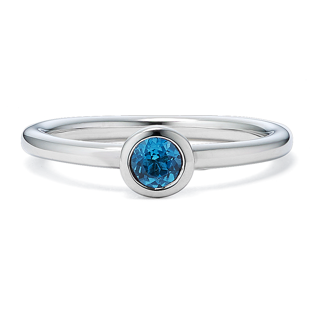 Bezel set blue topaz on sale ring