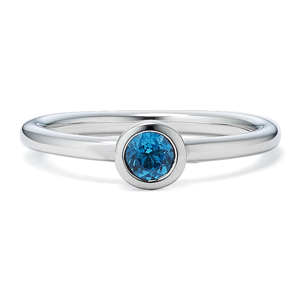 Bezel-Set Blue Topaz Ring - Sterling Silver | Shane Co.